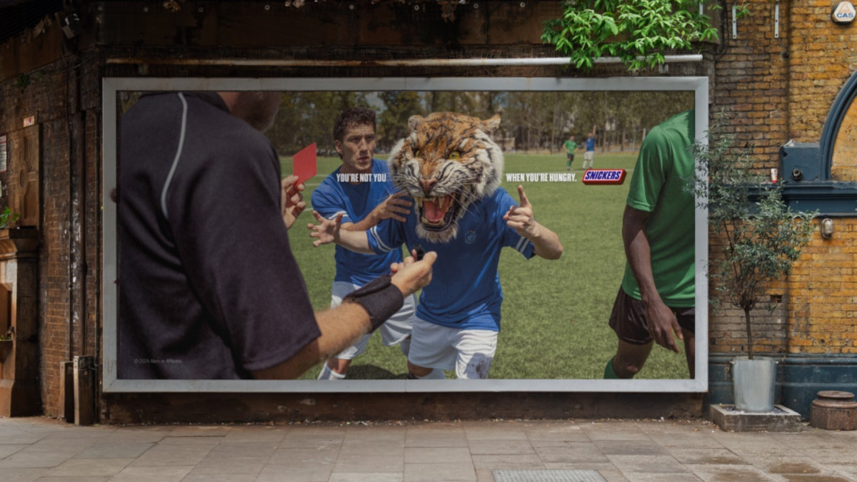 A football player with a lion face on a poster