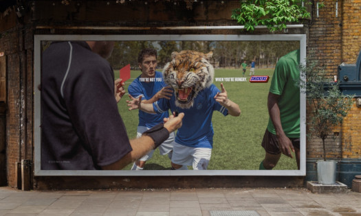A football player with a lion face on a poster