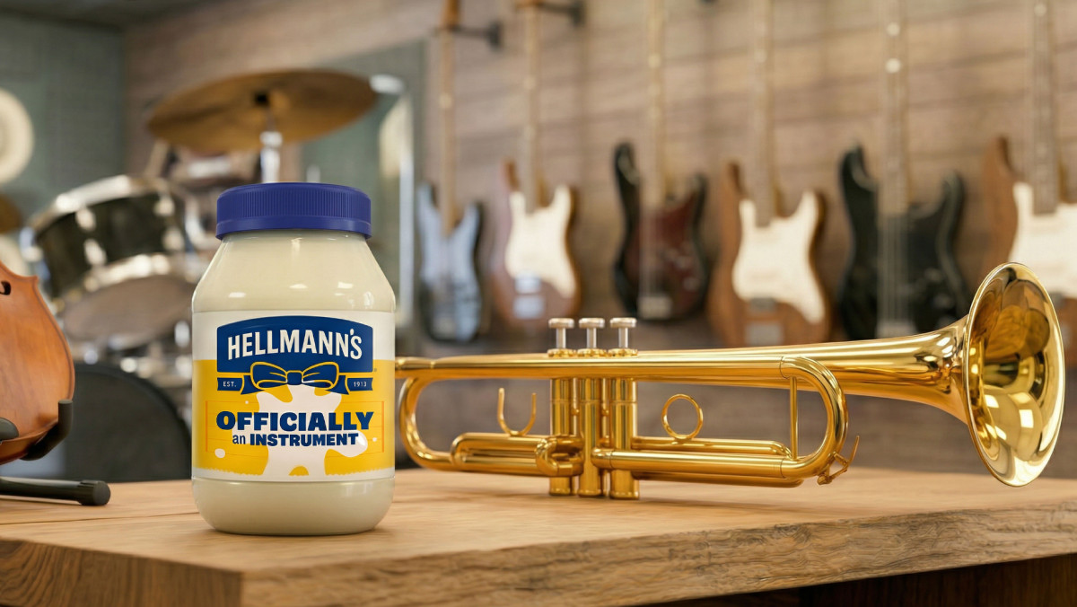 A Hellmann's jar beside a trumpet