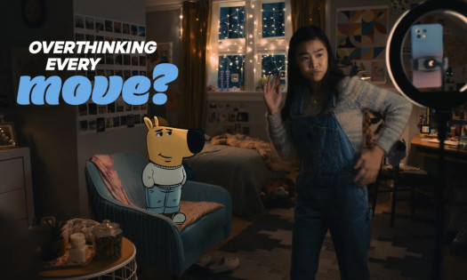 A young girl in the bedroom with the "chill guy" meme