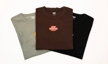 UNIQLO T-shirts pictured with Nissin Foods logos embroidered onto the front