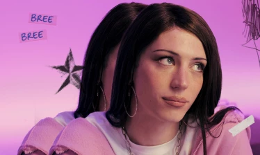 A woman in a pink jacket