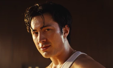 Hudson Williams working out with Peloton equipment