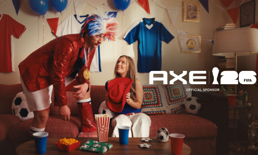 Two football fans in the living room