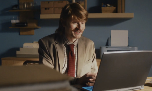 A man behind his desk