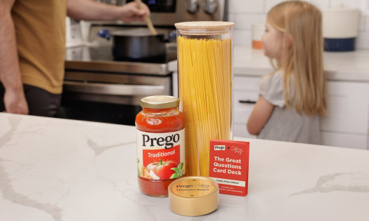 The Conversation Keeper, pictured alongside a jar of Prego sauce, pasta noodles and a conversation card deck