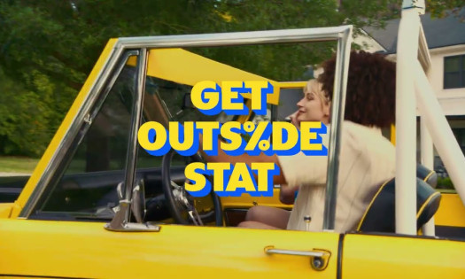 Two women in a yellow car