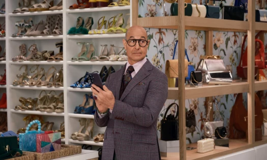 Stanley Tucci with a Google smartphone