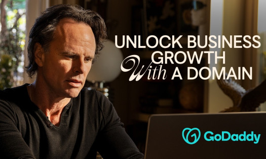 Walton Goggins on his laptop