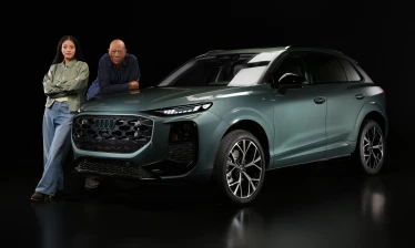 Morgan Freeman and Chase Infiniti pictured standing next to the Audi Q3