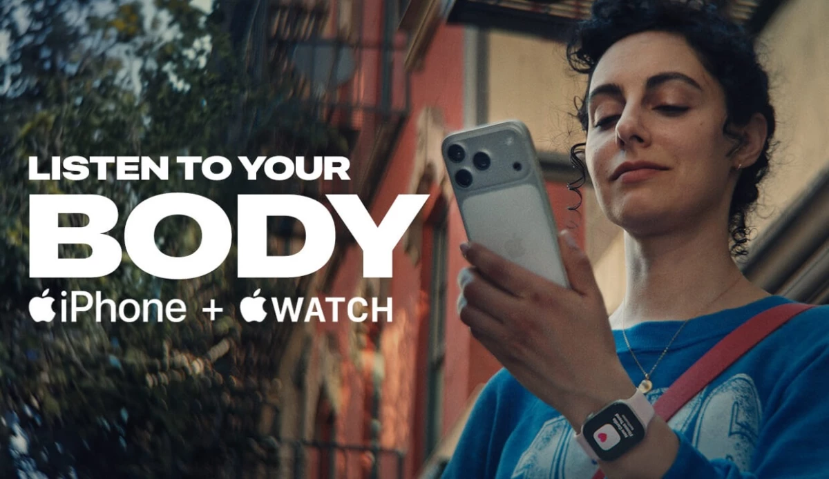 Listen to your body typography with woman staring at her phone.