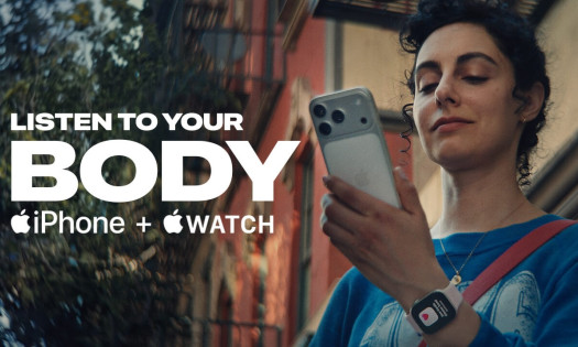 Listen to your body typography with woman staring at her phone.
