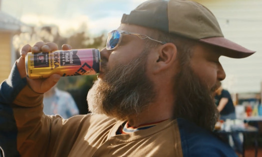 Action Bronson pictured with Minute Maid Spiked beverages, in the brand's latest campaign