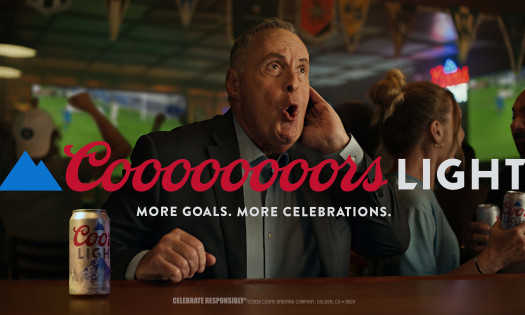 Andres Cantor celebrating a goal with Coors Light