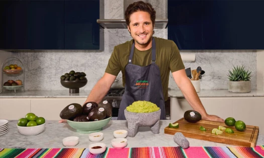Diego Boneta prepares guacamole with Avocados From Mexico for its 2026 Cinco de Mayo campaign.