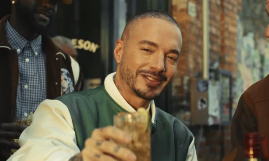 J Balvin with a glass of Jameson
