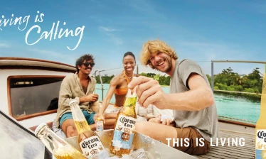 Corona’s "Living is Calling" campaign shows friends enjoying Corona Cero on a boat as part of the brand’s “This Is Living” platform.