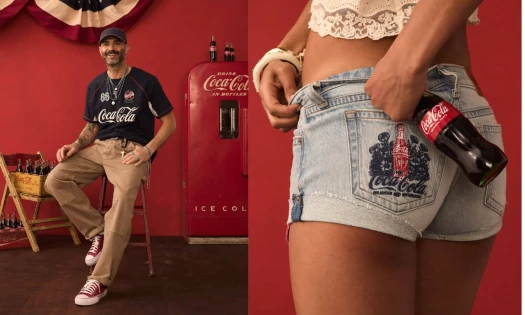 Lucky Brand x Coca-Cola collection featuring the soccer jersey and denim festival shorts against a vintage red Americana backdrop