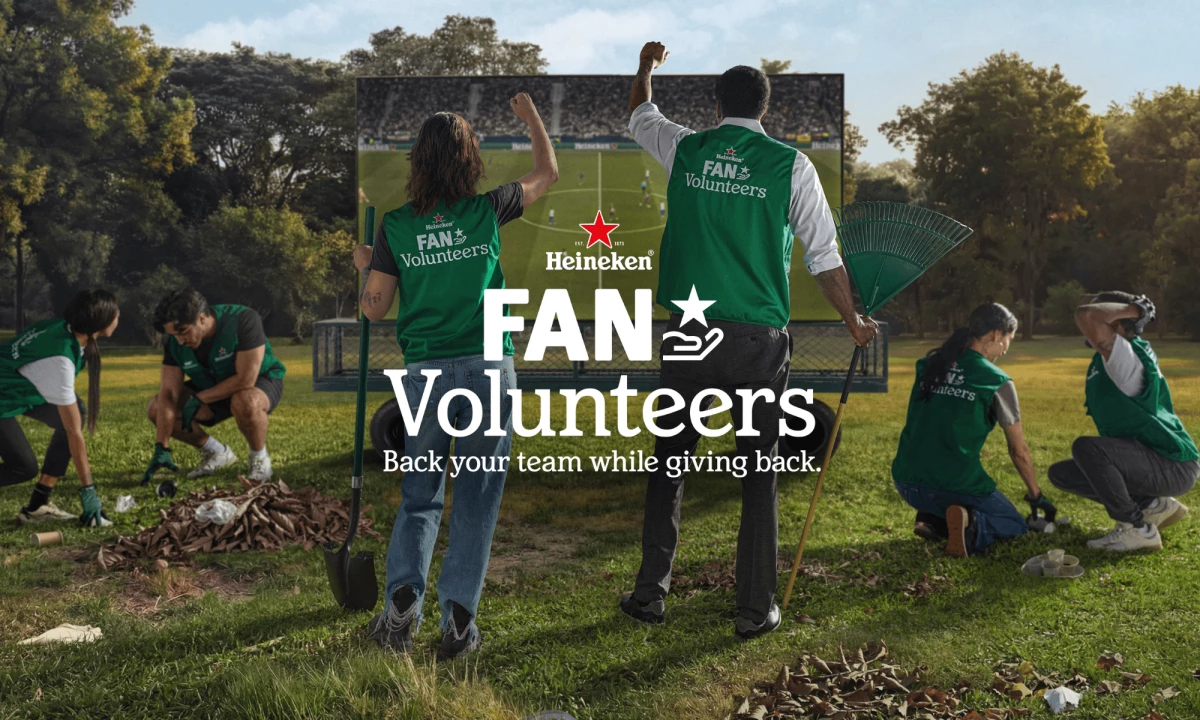 Heineken Fan Volunteers clean up a park while watching a soccer match outdoors as part of the brand’s match-day VTO campaign.