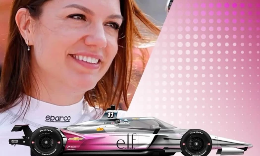 Katherine Legge's race car number 78 wrapped in e.l.f. branding, zipping down a track.