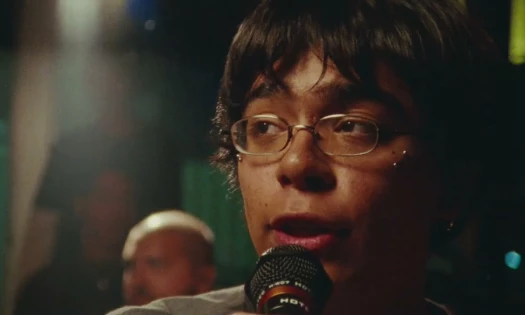 A man speaking into the mic