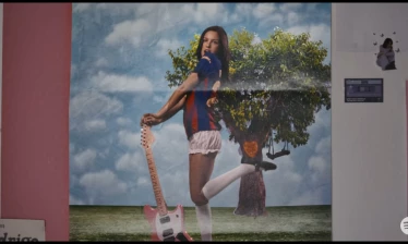 Olivia Rodrigo in a wall poster rocking an FC Barcelona Jersey