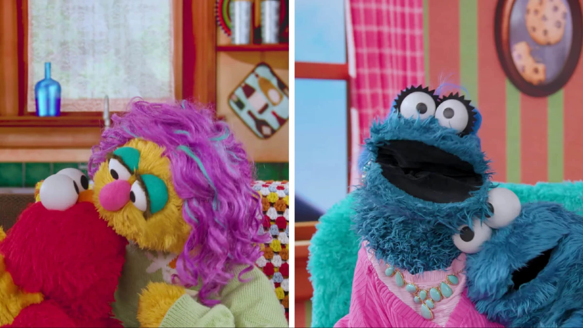 Elmo and Cookie Monster with their mothers