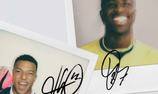 Signed Polaroid of Mbappé and Vini Jr