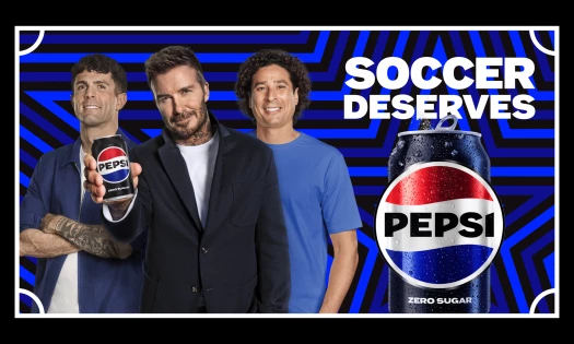 Christian Pulisic, David Beckham and Guillermo "Memo" Ochoa stand beside a Pepsi Zero Sugar can in a “Soccer Deserves Pepsi” campaign graphic.