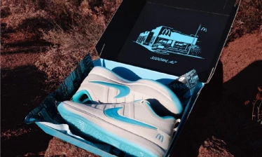 Nike Book 2 McDonald's in custom branded sneaker box with a desert background.
