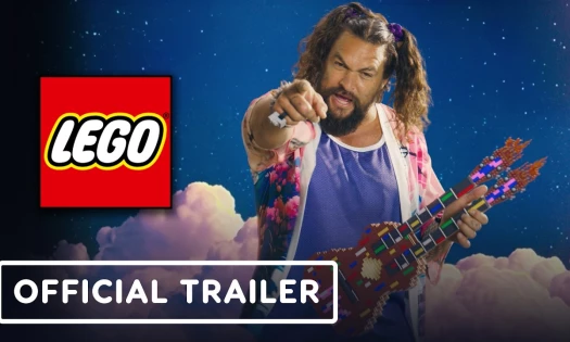 Jason Momoa holding up a LEGO guitar