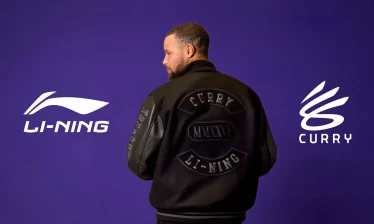 Stephen Curry wearing a Curry Li-Ning jacket stands between the Li-Ning and Curry Brand logos on a purple background.