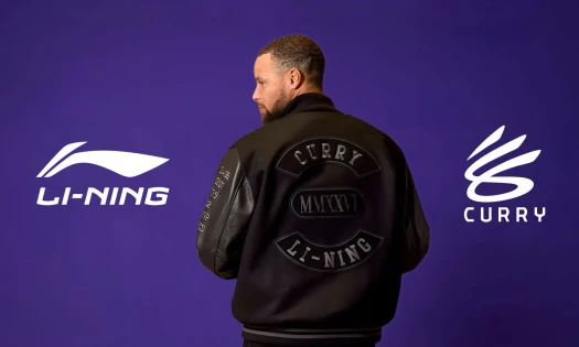 Stephen Curry wearing a Curry Li-Ning jacket stands between the Li-Ning and Curry Brand logos on a purple background.