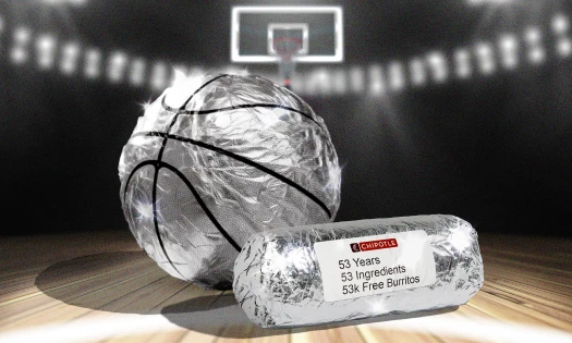 A basketball and a burrito wrapped in tinfoil