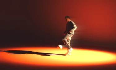 Lamine Yamal dribbling under the spotlight
