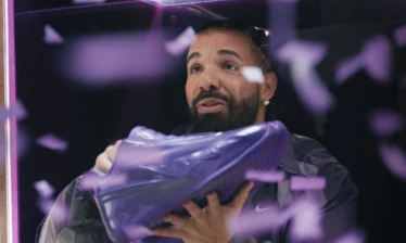 Drake holding the Nike KD19