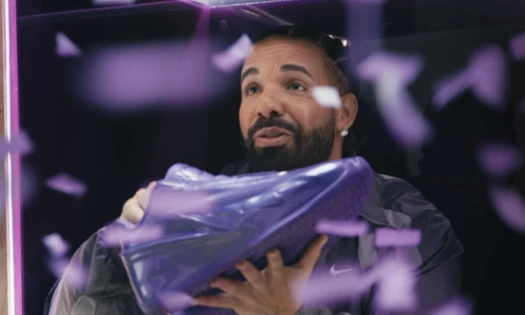 Drake holding the Nike KD19