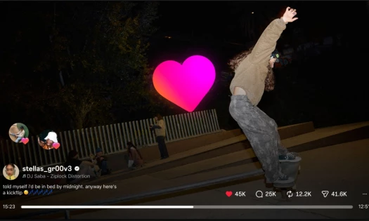 Skateboarder performing a trick in Instagram's horizontal view format with the platforms heart symbol in the center of the screen.