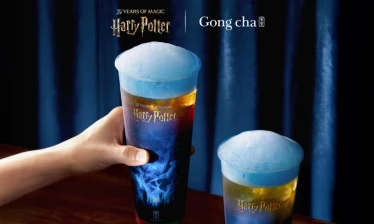 Foaming bubble tea in a Harry Potter branded cups.