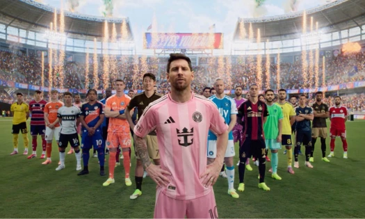 Lionel Messi and multiple football icons on the pitch