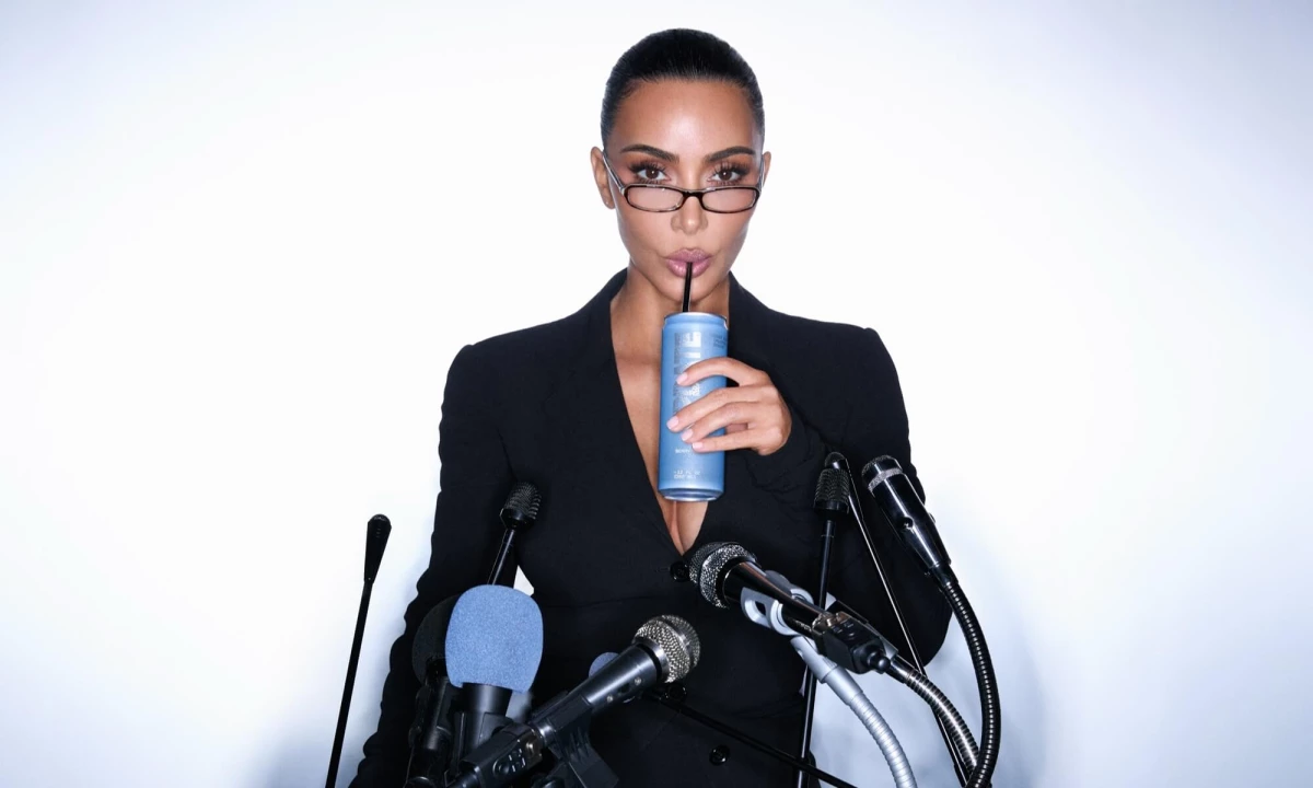 Kim Kardashian behind a microphone
