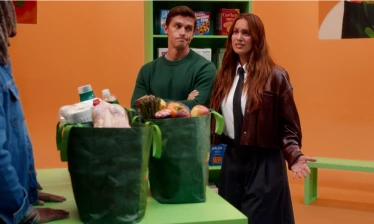 Antoni Porowski and Hannah Berner with bags of Instacart