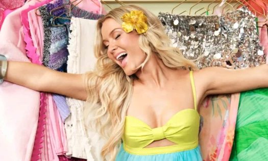 Zara Larsson in front of her wardrobe