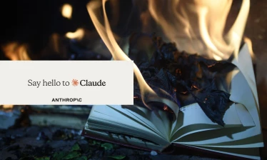 Books burning with a tag reading "Say hello to Claude" the Anthropic logo is below it.