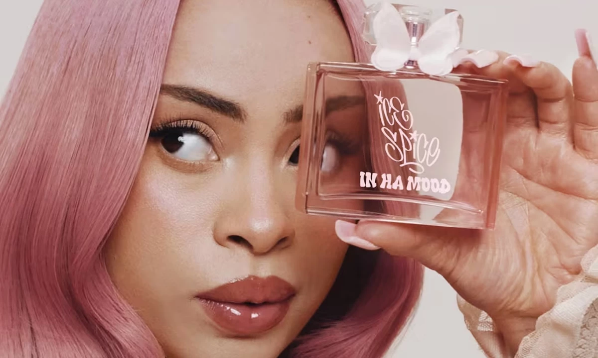 Promotional photo for Ulta showing Ice Spice posing with her fragrance, In Ha Mood