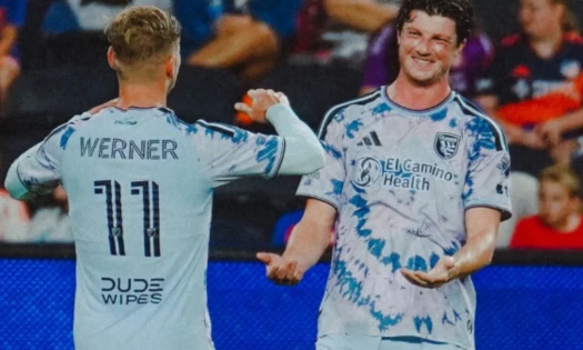 San Jose Earthquake players in the kit with the DUDE Wipes logo placement on the back.