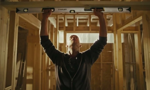 A man in his shed using Stanley tools