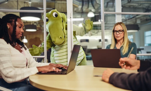 Niles in the Crocs HQ with other employees