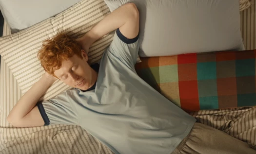 Ben Marshall lying on Brooklinen