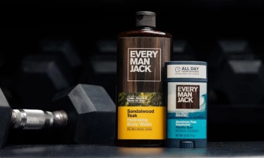 Every Man Jack x Baker Mayfield Deodorant next to a dumbbell.